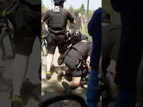 23 people arrested when rally, counterprotesters clash in Seattle