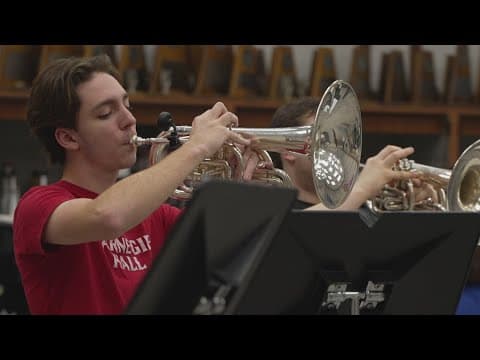 Grapevine High School Band preparing to take the stage before Post Malone's concert at AT&T Stadium