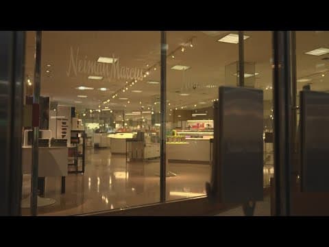 Neiman Marcus' parent company says it still plans to close the iconic downtown store for now