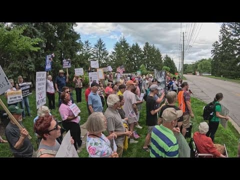 Hoosiers protest federal immigration policies outside Sen. Todd Young's office in Carmel