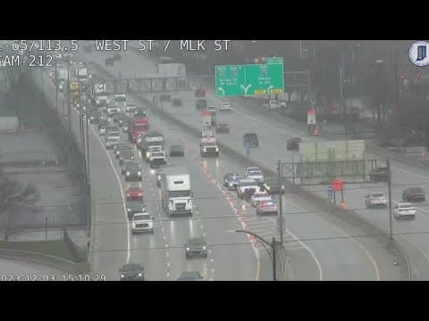 Body found with gunshot wounds inside car on Interstate 65 in downtown Indy