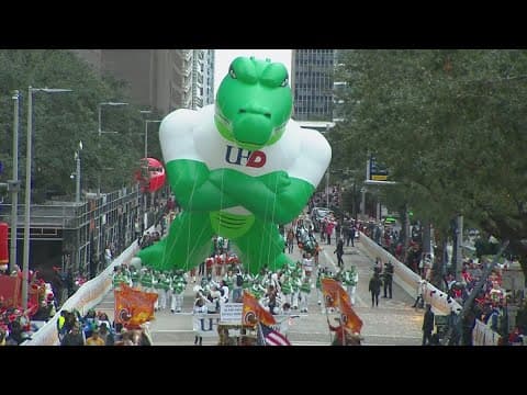 Ed U Gator, University of Houston Downtown mascot, rolls through the H-E-b Thanksgiving Day parade