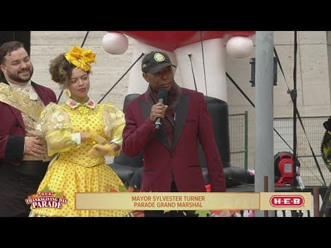 Houston Mayor Sylvester Turner kicks off the parade with co-grand marshals Rudy T. and Calvin Murphy