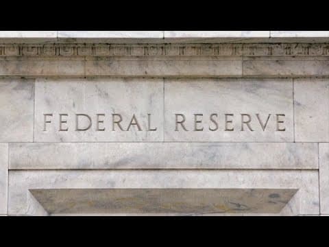 Fed cuts rates by half a point