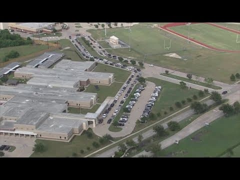 With bus routes cut in Cy-Fair ISD, here's what the dropoff-pickup lines at one school looked like