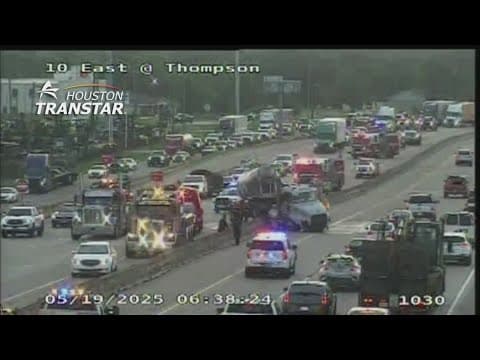 Truck stuck on barrier of East Freeway, causing backups in both directions