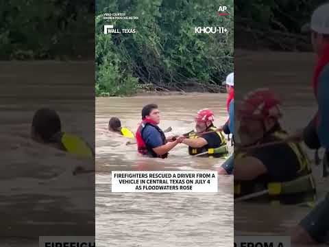 It was a scary scene, but firefighters managed to pull a driver from July 4 floodwaters. 👏