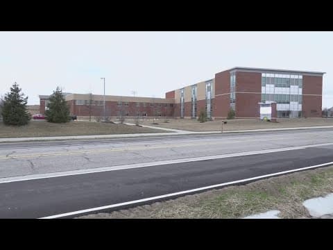 Former Greenwood wrestling coach charged after allegedly sending naked photos to student