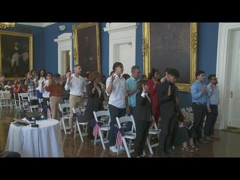 New United States citizens sworn in at Gallier Hall