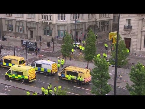 Driver arrested after car plows into celebrating Liverpool fans