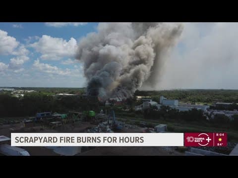 Hillsborough crews extinguishing hotspots at massive scrapyard fire that left 2 firefighters hurt