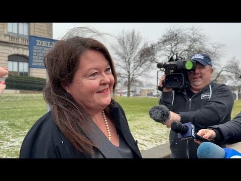 Jennifer Auger, with Richard Allen's defense team, talks after sentencing