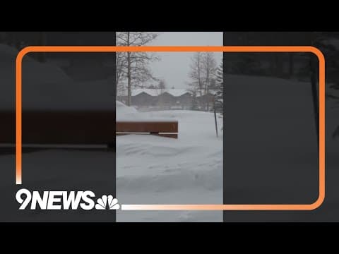 Heavy snow falls in mountains of Colorado west of Denver