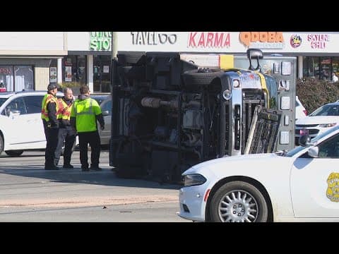 Ambulance flips in crash at north side intersection