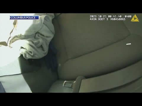 Police officer helps deliver baby in back seat