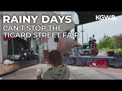 Crowds brave rain at Tigard street fair with more than 70 vendors, music, food and family fun