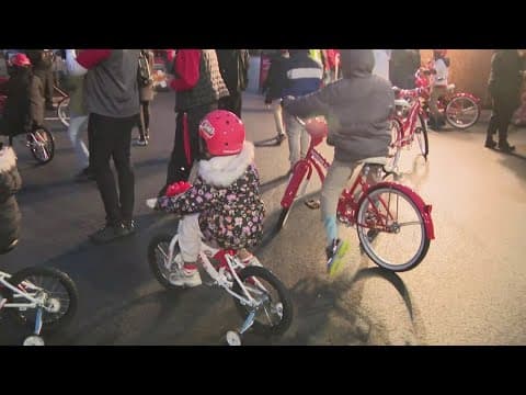 Commanders QB Jayden Daniels distributes bikes in Bowie
