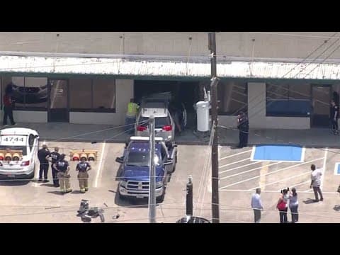 Car plows into northwest Harris County business | Raw video