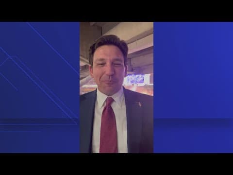 Gov. Ron DeSantis does Gator chomp after UF basketball wins national championship