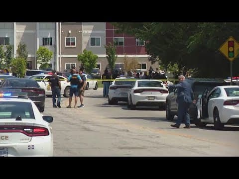 Police officer shot, 1 suspect still at large