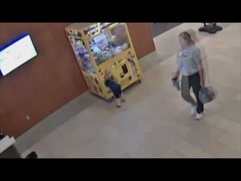 Surveillance cameras capture moment little boy climbs inside claw machine