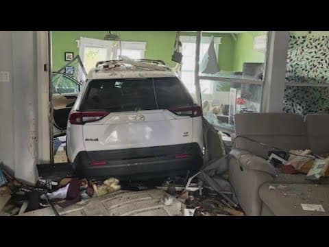 Driver plows SUV through Spring-area house, family unharmed