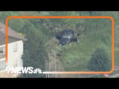 Car runs off road in Aurora