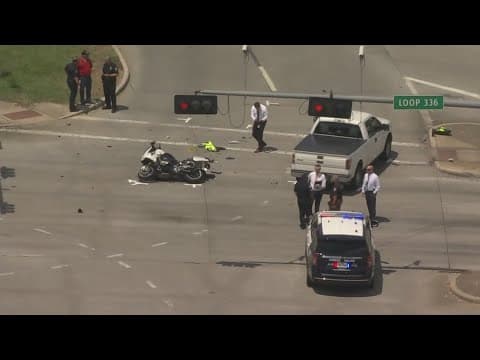 Conroe police officer struck by pickup truck, thrown from his motorcycle