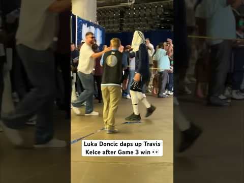 Luka Doncic daps up Travis Kelce after Game 3 win