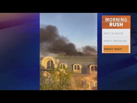 Visitors spot a cloud of smoke at Disney's EPCOT