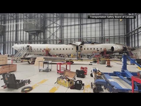 What caused the Delta plane to flip over on the runway?