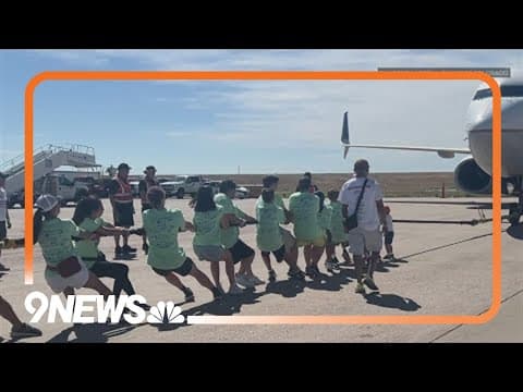 Teams compete in Special Olympics Plane Pull at DIA