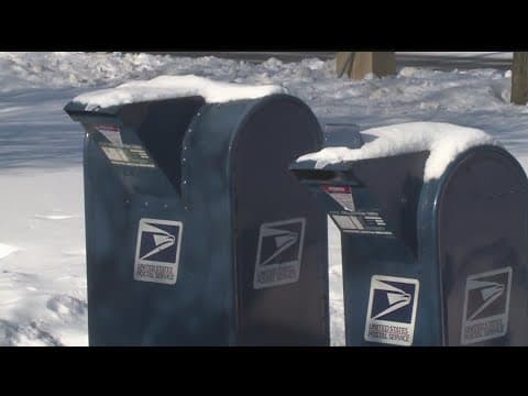 Customers rush to the post office before winter storms