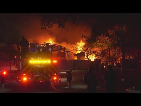 Crews battle large house fire in The Heights