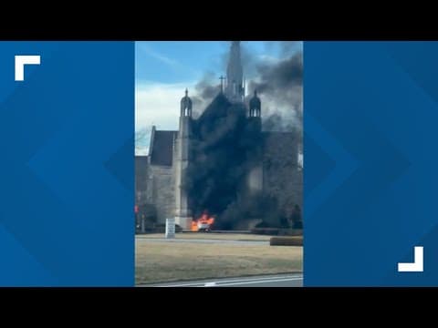 Car catches fire in front of church