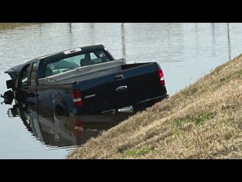 Two-vehicle crash in Metairie sends truck into canal
