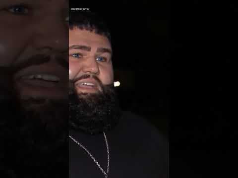 Travelers on a JetBlue flight were forced to evacuate after a backpack burst into flames.