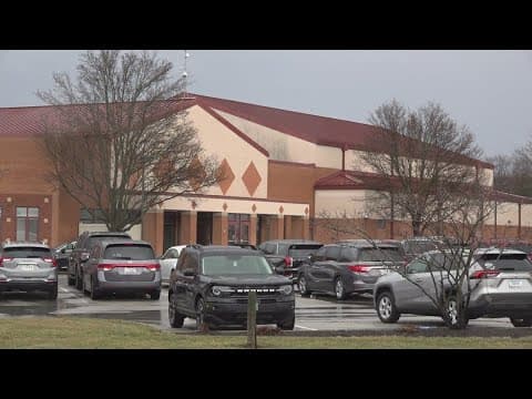 Worker arrested for bringing gun to Fishers elementary school