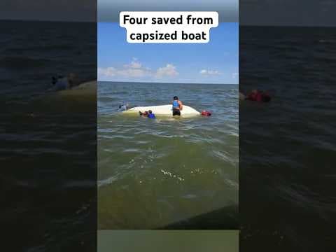 Firefighters commandeered a nearby family’s boat and pulled them out of the water.