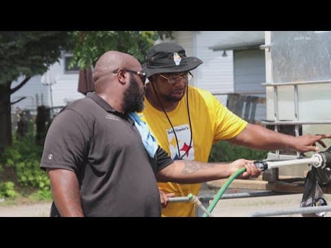 Community comes together to release lanterns in memory of 'Coach Nell'