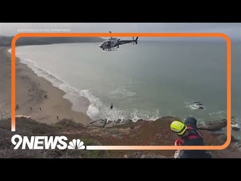 Amazing rescue caught on camera after man dangles off cliff in California