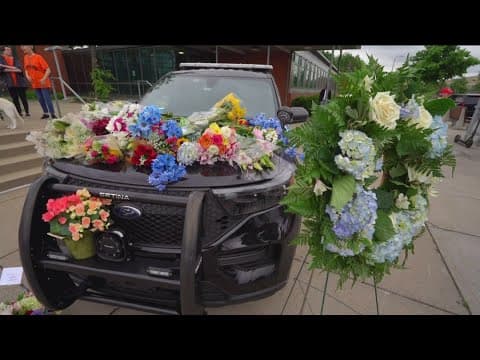 Slain officer Jamal Mitchell tried to help shooter before he died, BCA said