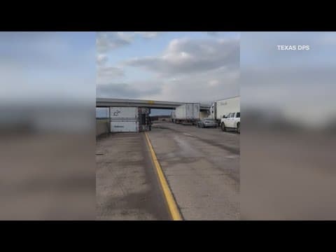 Six overturned 18-wheelers block I-35E after severe storms topple trucks