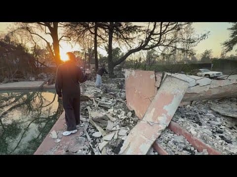 Firefighters hope for a break from fierce winds fueling devastating blazes in Los Angeles area
