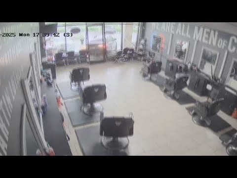 Camera captures moment car crashes into Lanham barbershop