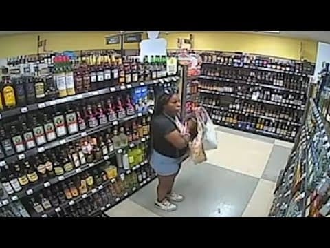 Surveillance video shows Ta’Kiya shoplifting bottles of alcohol before being fatally shot by police
