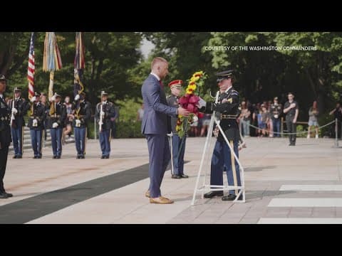 Washington Commanders tight end participates in wreathe laying ceremony