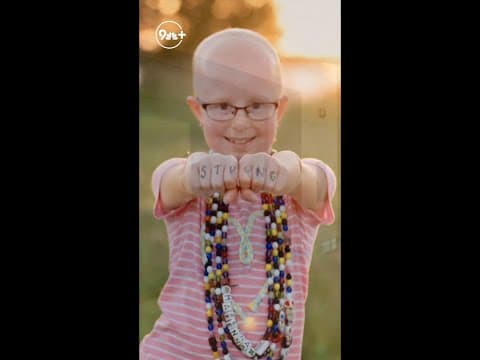 Girl unveils Lego 'Hope' sign at hospital that treated her cancer