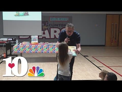 Traveling librarian stops at South Clinton Elementary to speak with students about reading