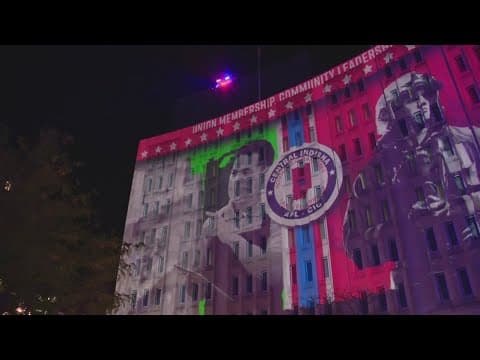 Monument Circle picture display lights up AES building to honor Labor Day